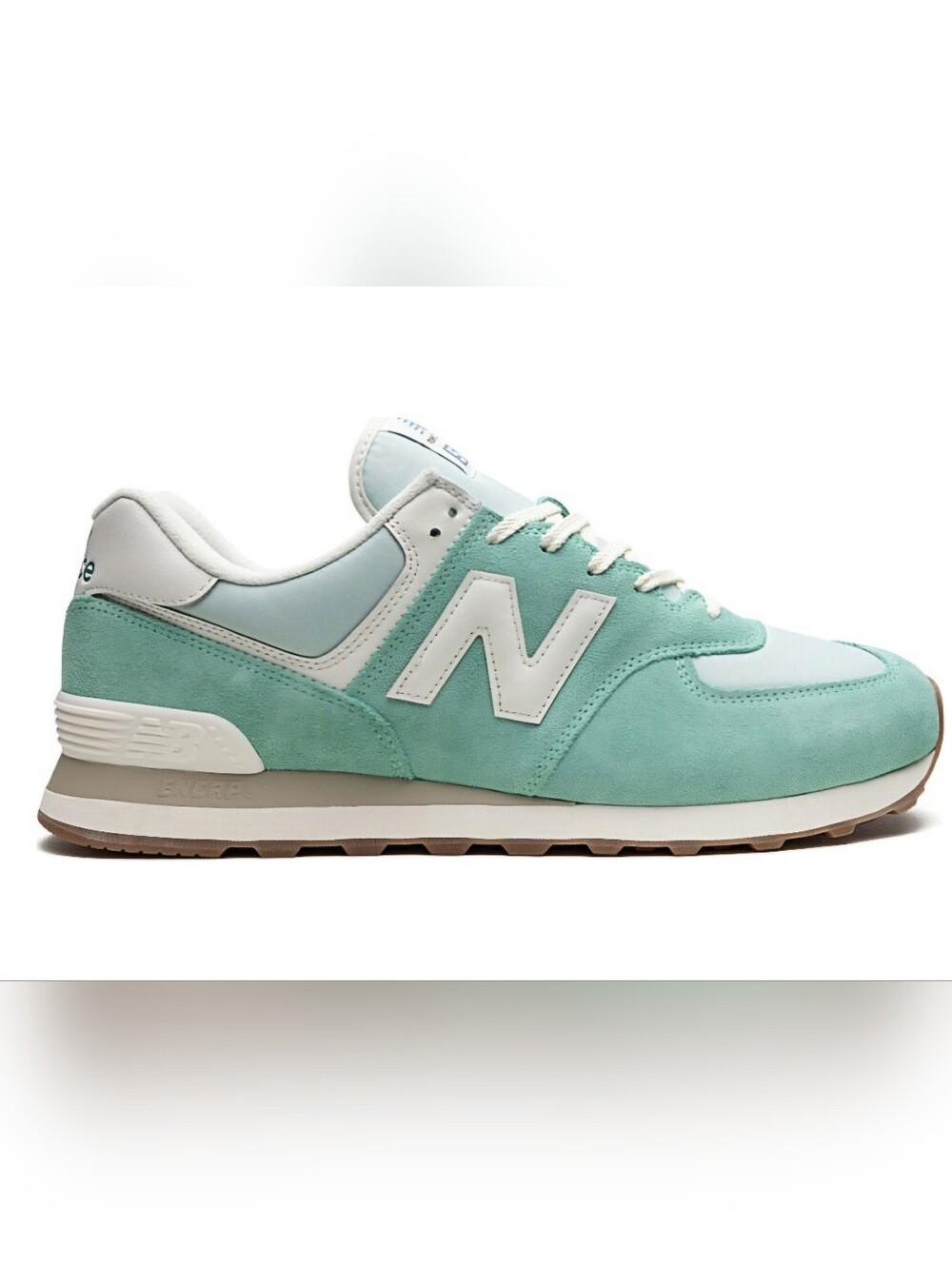 New Balance 574 sneakers, featuring a distinctive seafoam green suede upper 6.5
